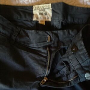 Nili Lotan black cotton trousers. Raw hem with a little stretch in the cotton.